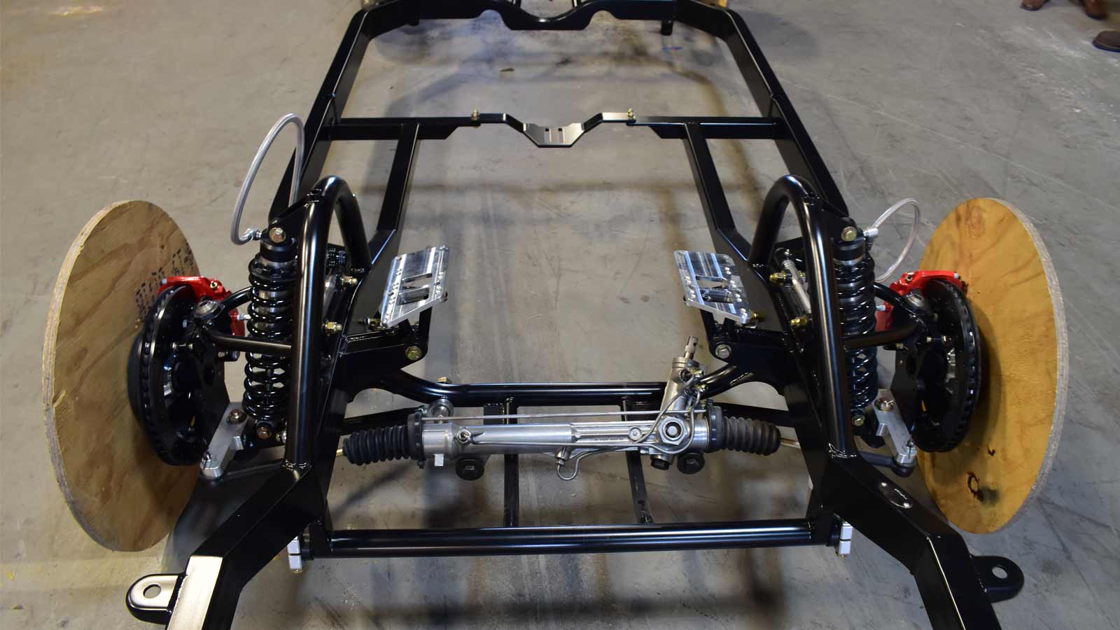 technician repairing car frame